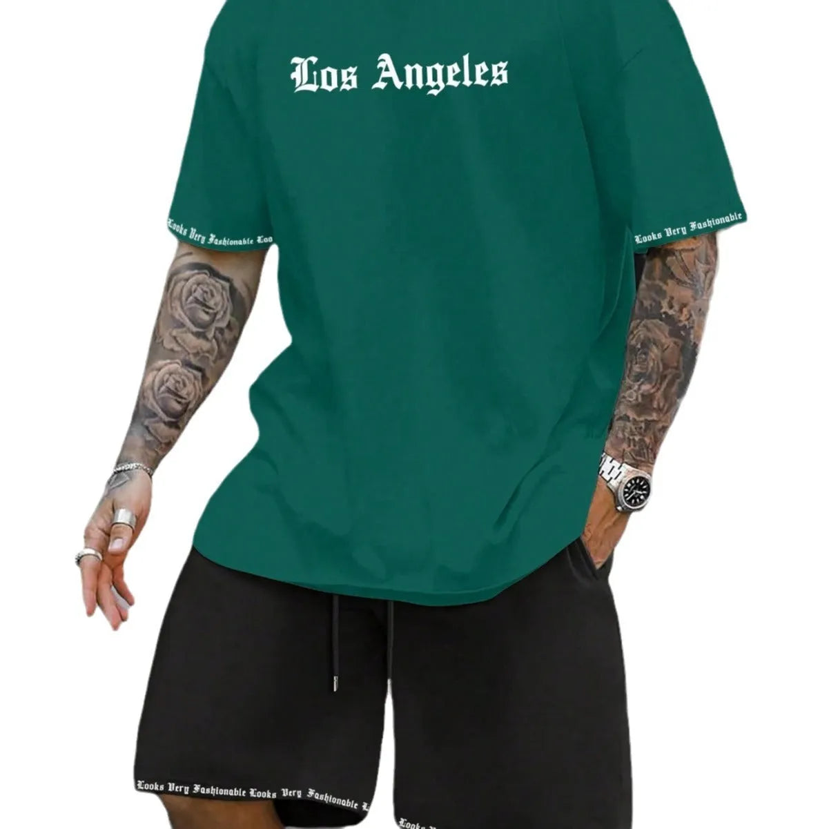 Sports style short-sleeved shirt and matching shorts set in a thin, printed fabric on a mannequin.
