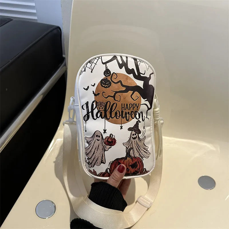 Halloween graffiti print crossbody bag with cartoon pumpkin ghost bat design in orange colour