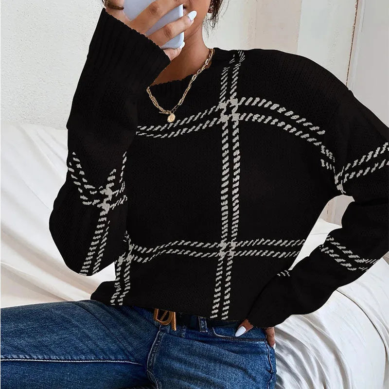 Women's loose fit plaid sweater with colour-block stripes in apricot, black, beige, red, and green.