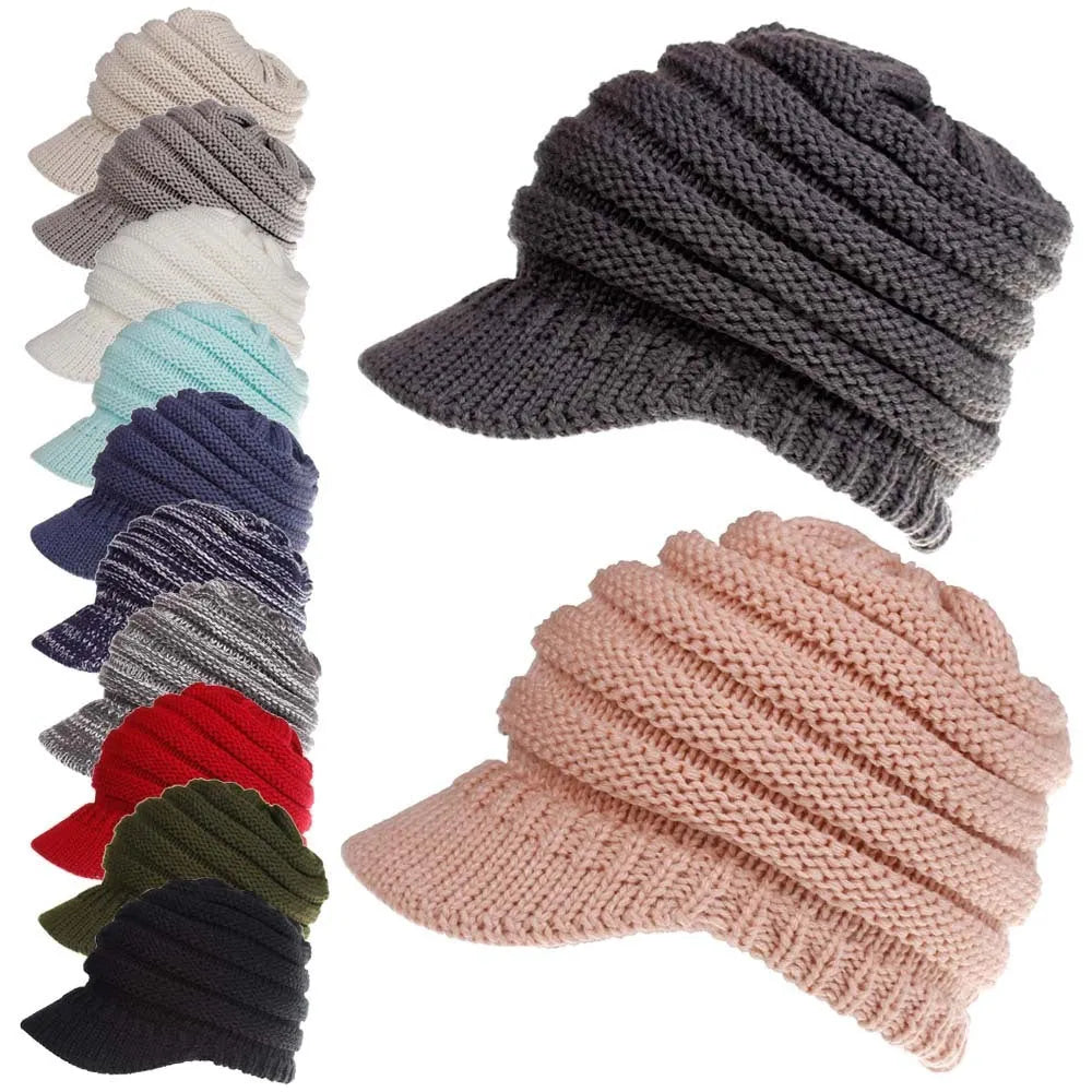 Women's grey knitted beanie with elastic opening at back for ponytail or bun hairstyle