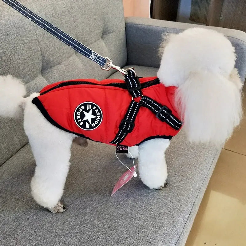 Waterproof dog coat with integrated harness in red, navy blue, or army green, shown on a dog.
