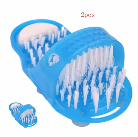 Blue shower feet slipper with suction cups and built-in pumice stone on a wet shower floor