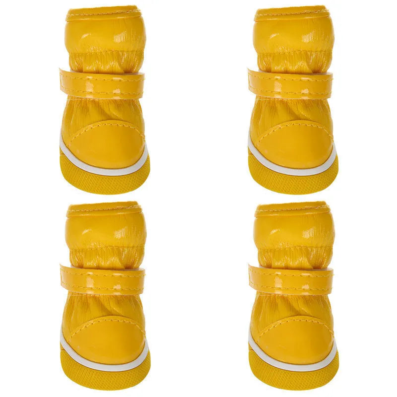 Dog cotton ski boots in four colours on a dog's paws for winter walking
