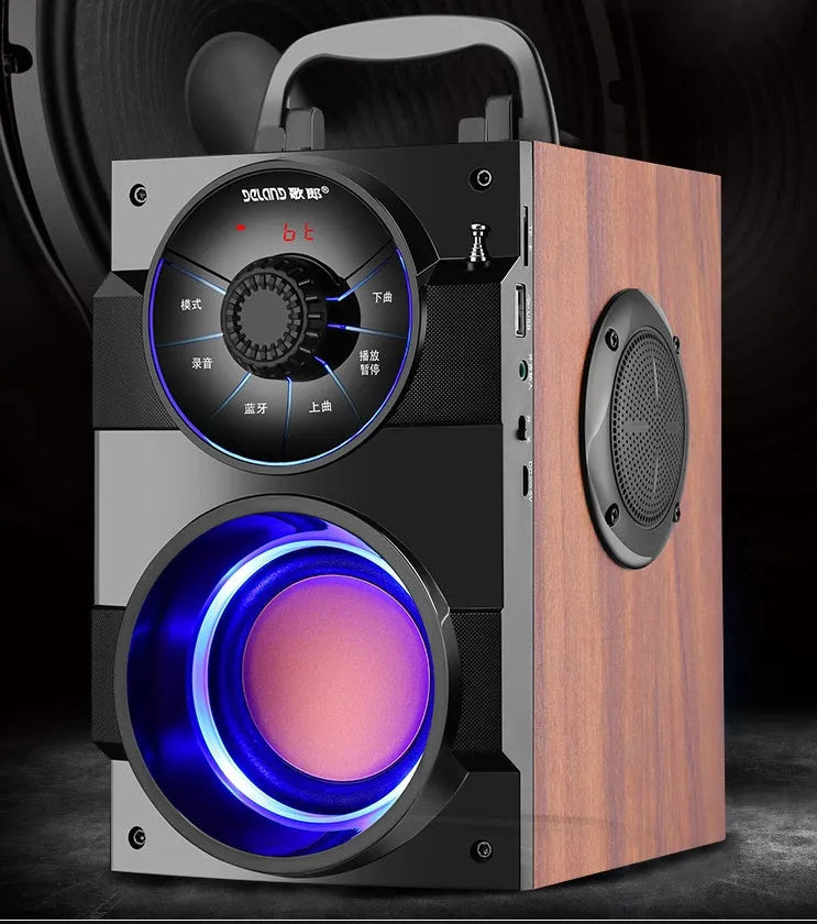 Black portable mini audio system with satellite speakers and subwoofer unit showing 3.5mm audio cable