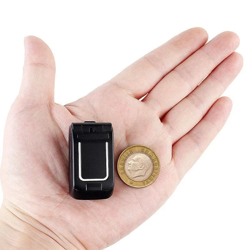 Mini flip phone in golden colour with small screen and flip cover design
