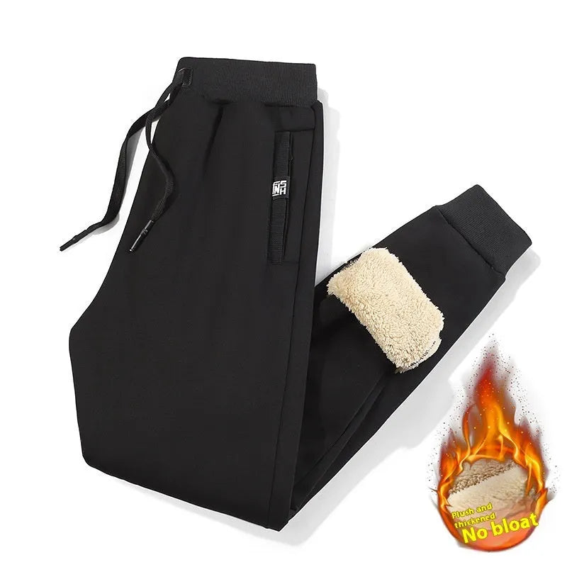 Men's gray fleece-lined oversized track pants with cotton fabric and drawstring waist