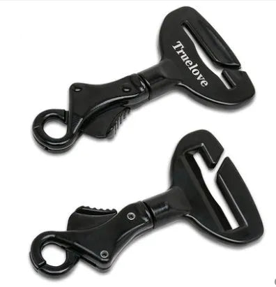 Black aluminium alloy pet car safety buckle with clip on a car seat belt