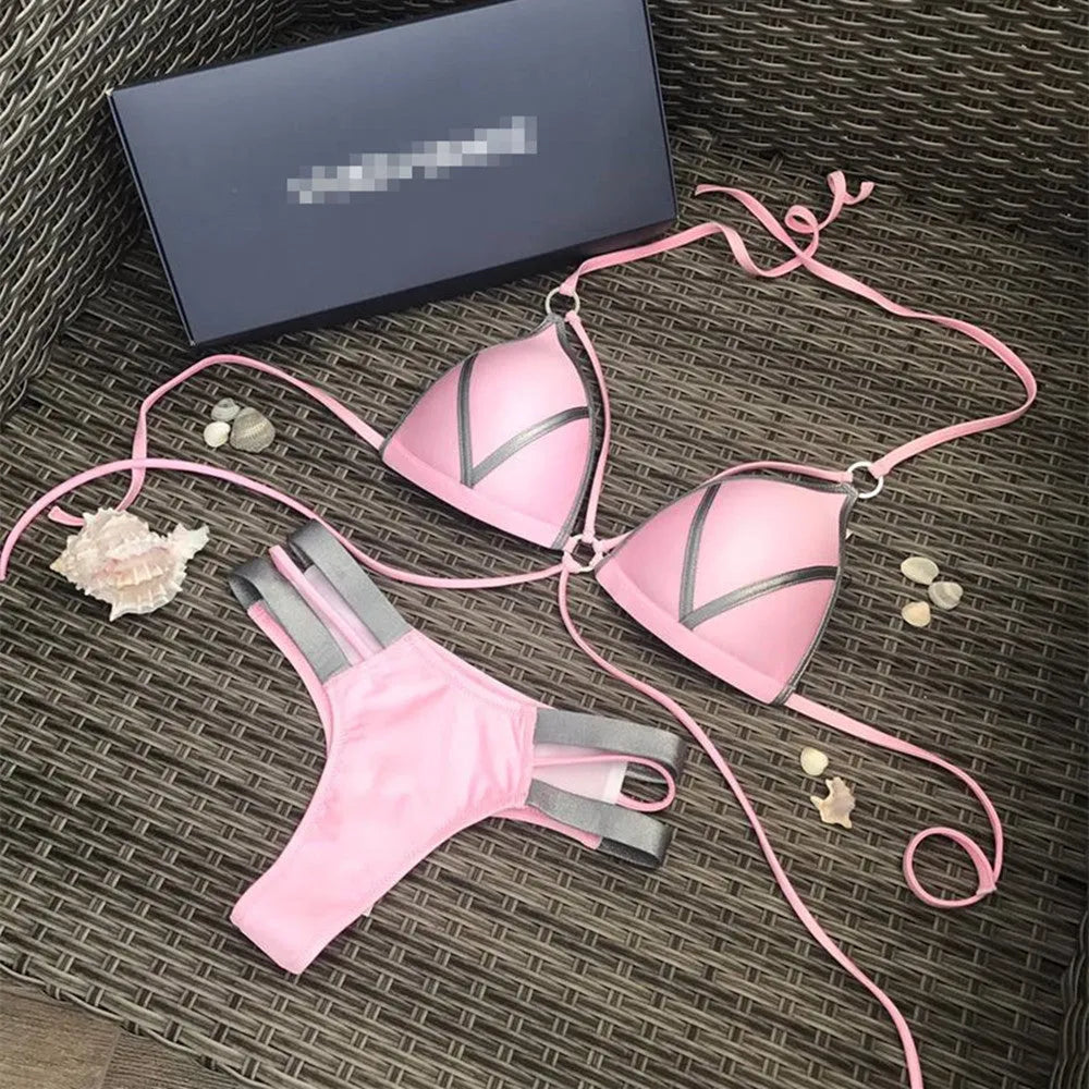 Women's bronzing bikini swimwear with padded cups, shown in a colour option like leopard print.