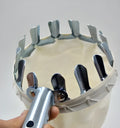 Metal fruit picker with silver ring and cotton bag for picking apples and pears in a garden