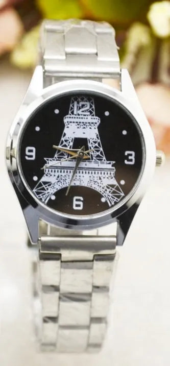 Eiffel Tower wrist watch with black leather strap and Roman numerals on the dial