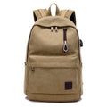 Canvas backpack with USB charging port and multiple pockets including a laptop compartment