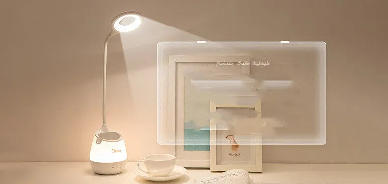 Green USB rechargeable LED table lamp with touch switch on a wooden desk