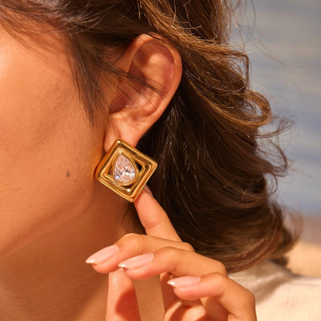 Geometric stud earrings with water drop zircon stones in gold electroplated stainless steel