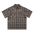 Men's black and brown plaid short-sleeve shirt with letter embroidery detail