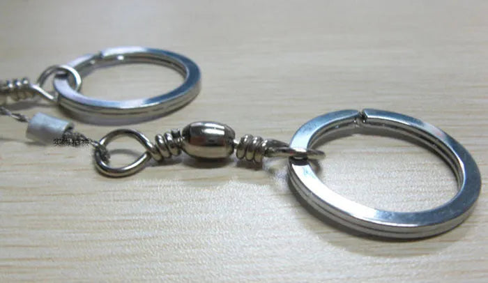 Multifunctional survival wire saw with stainless steel cutting wire and metal pull rings extended to full length
