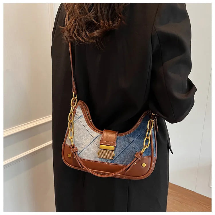 Brown denim women's bucket shoulder bag with diamond mesh patterns and chain details