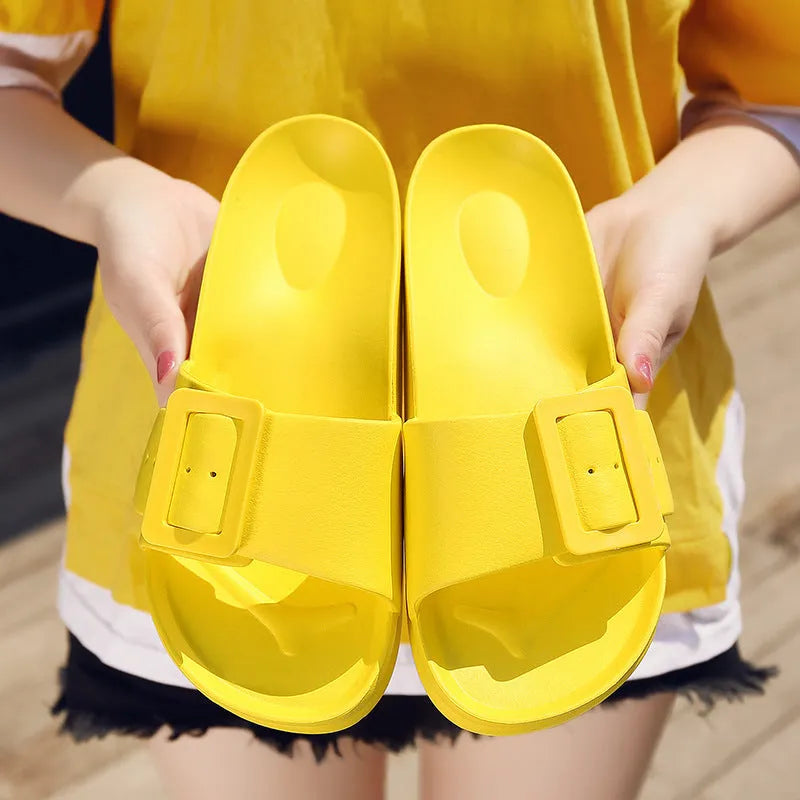Women's grey blue flip-flop slippers with adjustable buckle strap and textured EVA sole