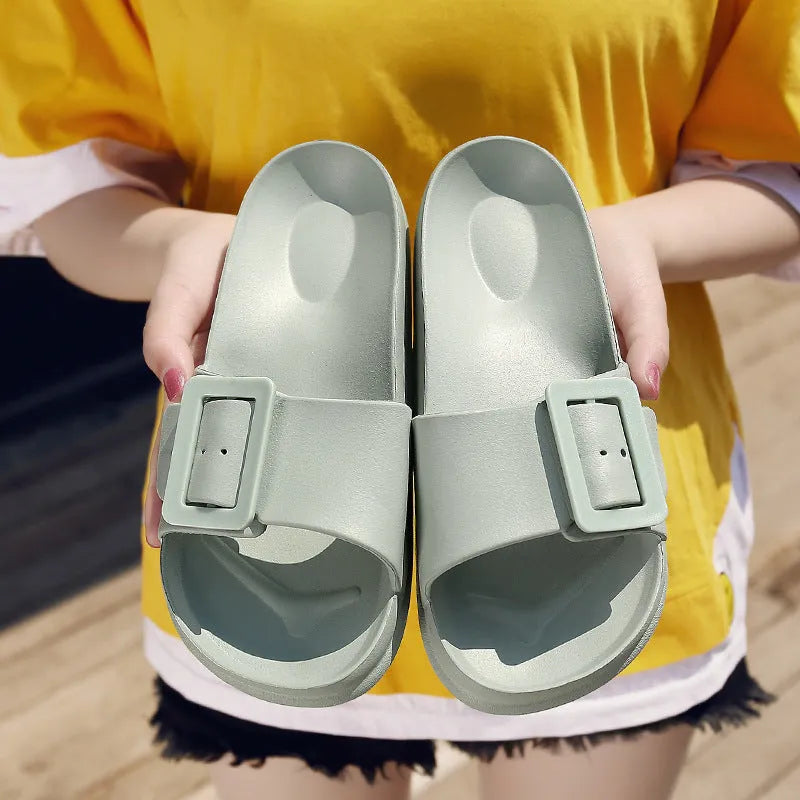 Women's grey blue flip-flop slippers with adjustable buckle strap and textured EVA sole