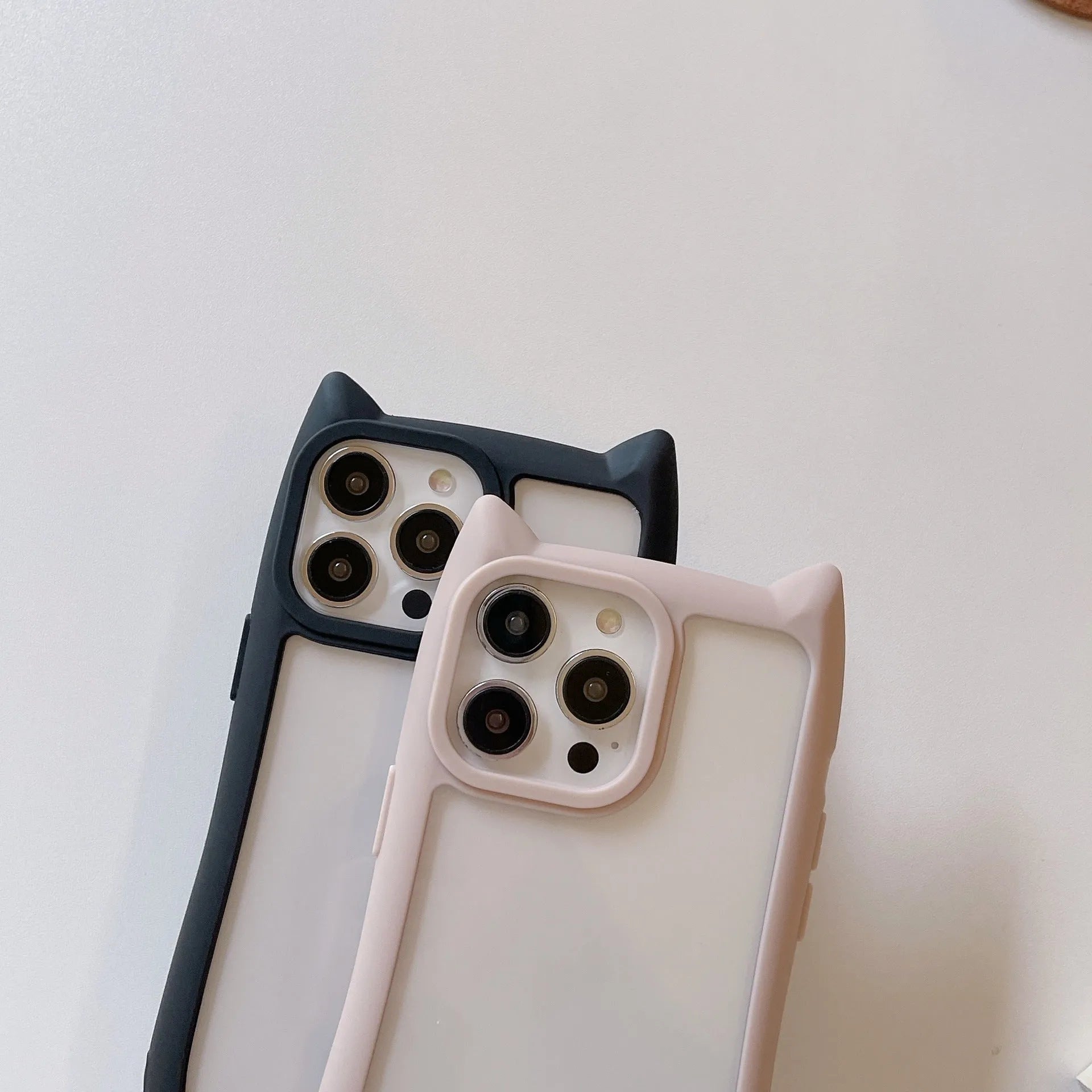 Acrylic high version cat ears phone case for iPhone 17 series in pink, with TPU bumper and clear back