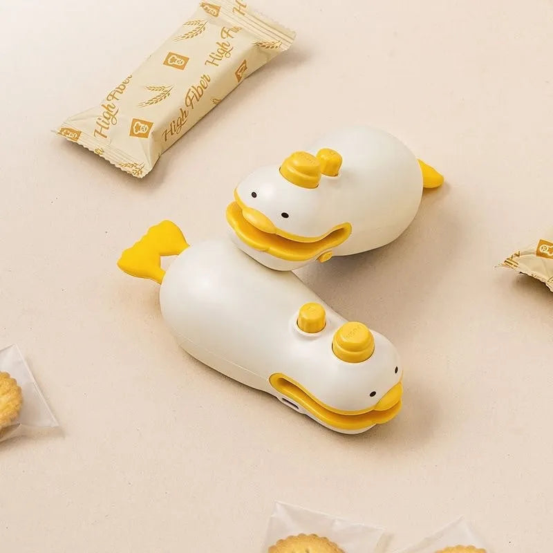Small yellow duck rechargeable sealing machine with animal jacquard pattern and charging cable