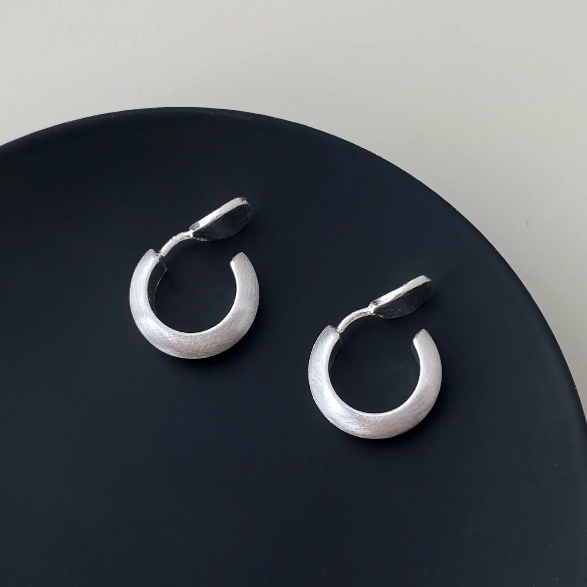 Geometric C-shaped brushed copper earrings with frosted finish available in gold or silver for women