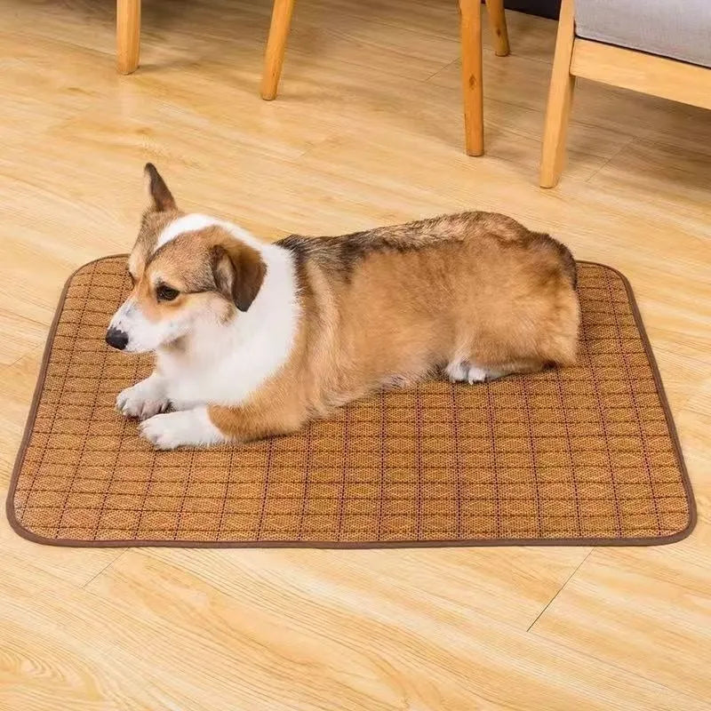 Brown rattan fibre cooling mat for dogs in large size, laid flat on a wooden floor.