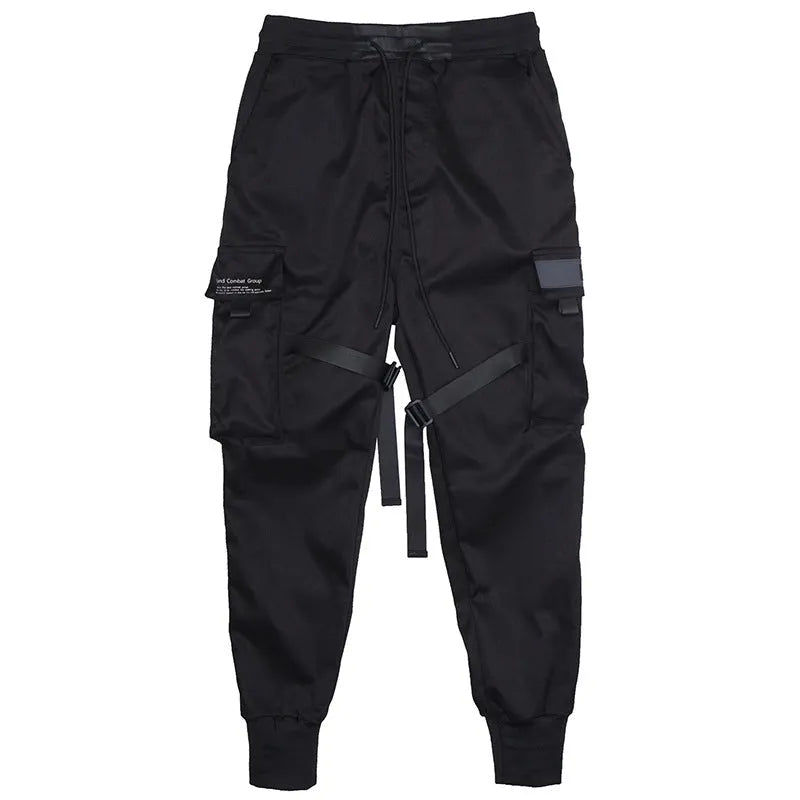 Black cotton overalls with tapered leg and small foot opening on plain background