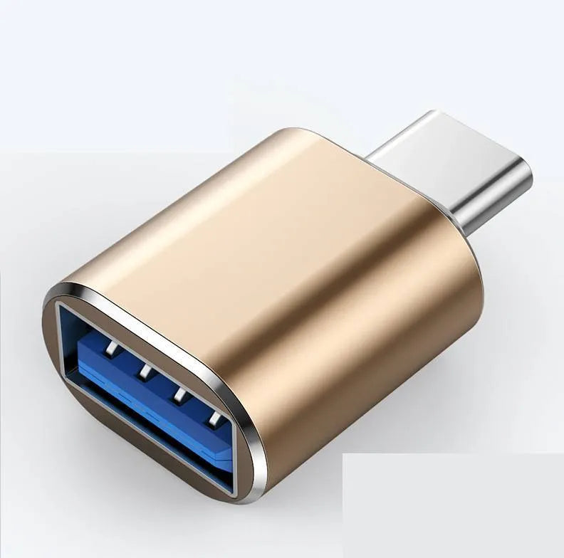 USB-C OTG adapter showing Type-C male connector and USB-A female port in black, silver, and gold colour options