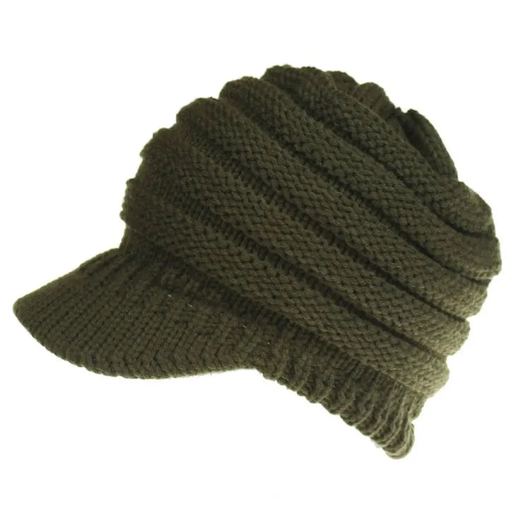 Women's grey knitted beanie with elastic opening at back for ponytail or bun hairstyle