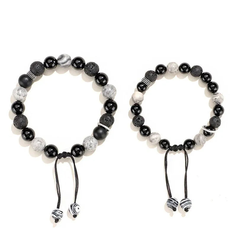 Black agate volcanic rock bracelet with diamond-cut facets, shown in two width sizes.