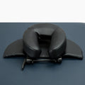 U-shaped SPA health pillow with PU leather cover on a massage table, black colour, showing adjustable height cradle