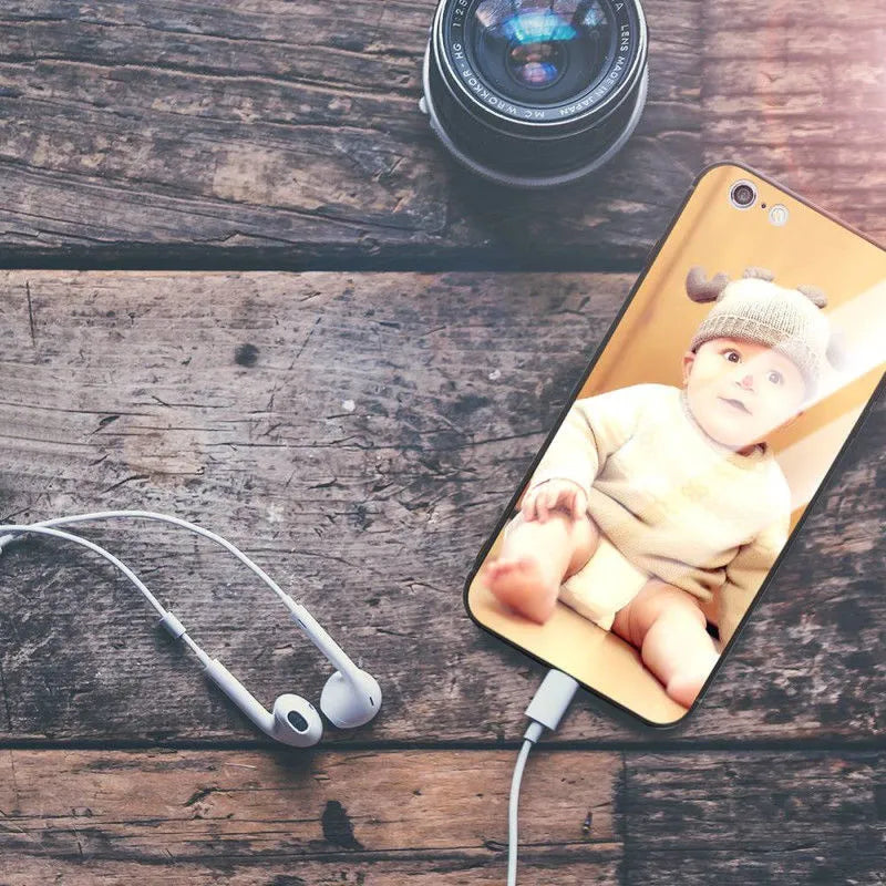 Ultra-thin iPhone case with raised bumper edge shown on an iPhone, highlighting camera and screen protection.