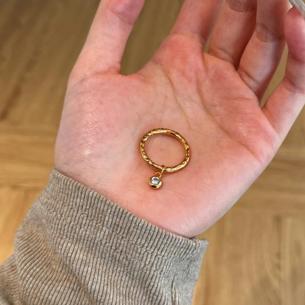 Women's silver ring with pleated texture in electroplated gold finish, available in sizes No 6 to No 8