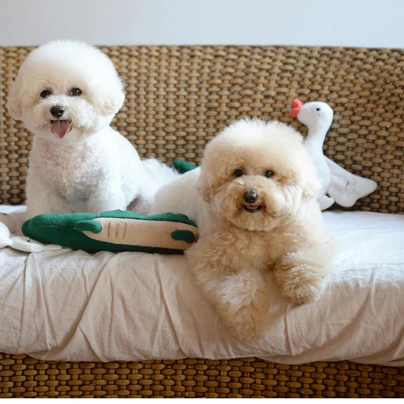 Green soft fabric plush dog toy shown on a white background.