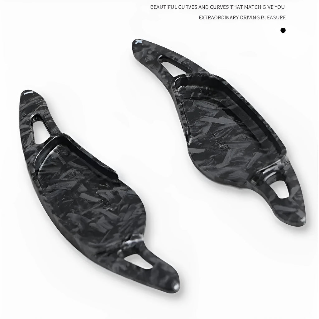 Carbon fibre pattern steering wheel paddle shift modification kit for car interior.