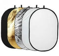 Collapsible 5-in-1 photography light reflector showing gold, silver, white, black and translucent surfaces