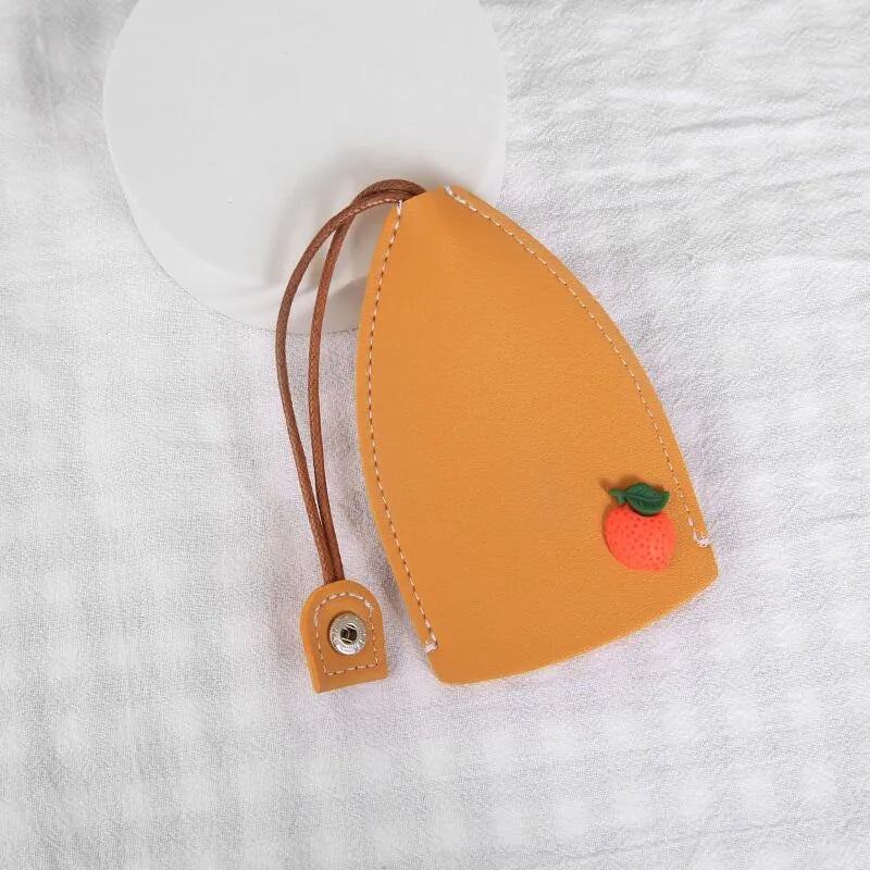 Cartoon design pull-out key case for car keys in PU leather.
