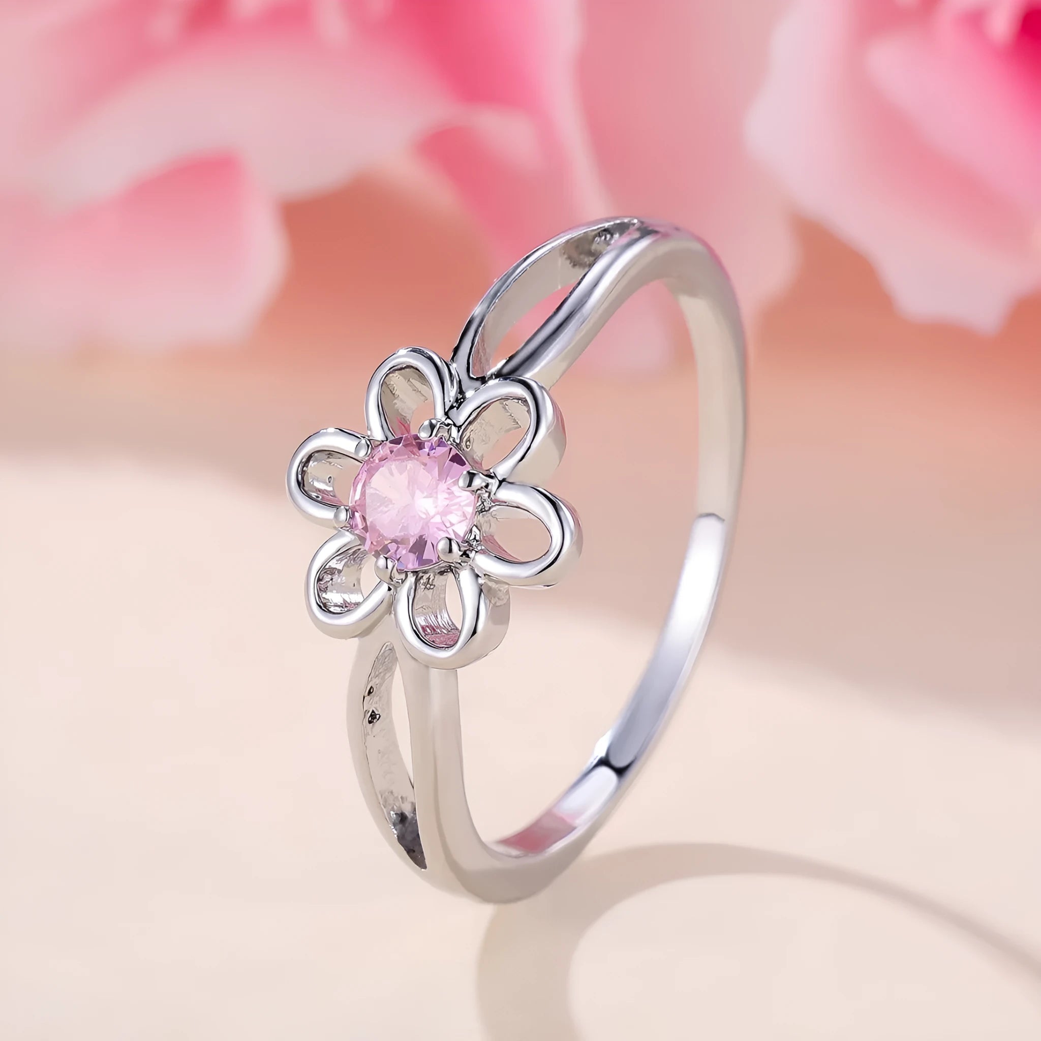 Women's hollow flower design ring in platinum pink diamond colour with white gold powder accents