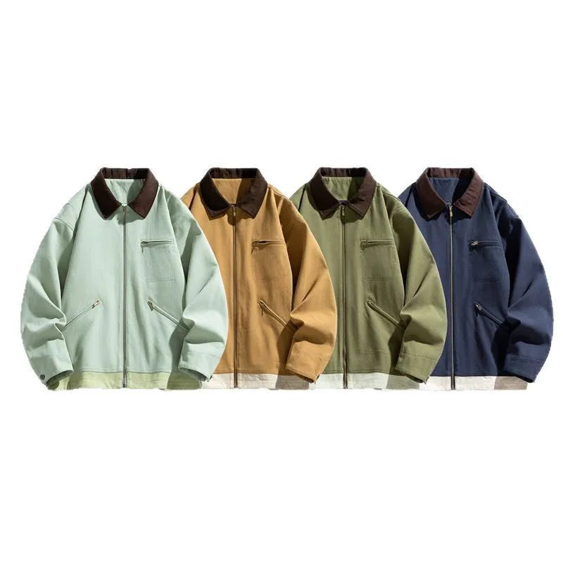 Man wearing a mint green loose-fit retro workwear jacket with contrast lapels and side seam pockets.