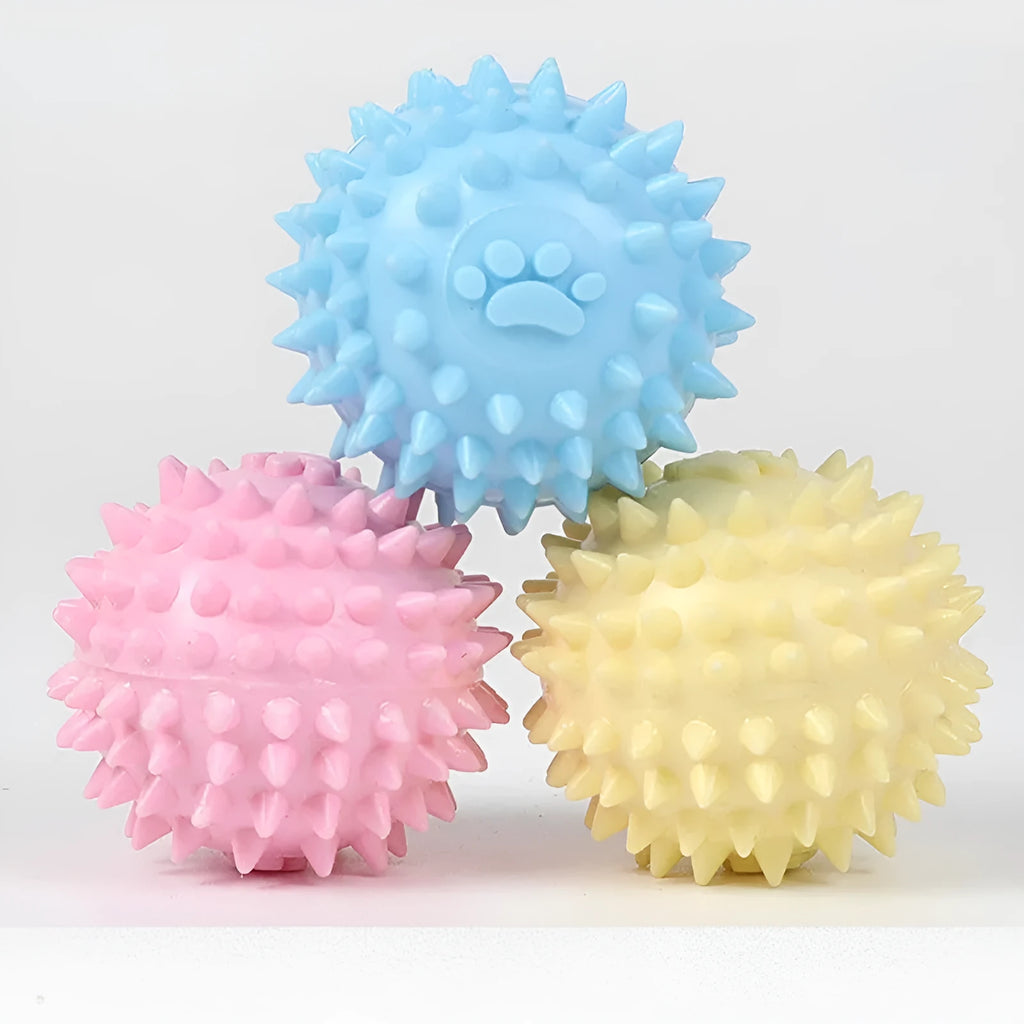 Blue TPR dog chew ball with footprint pattern and raised texture for dental cleaning