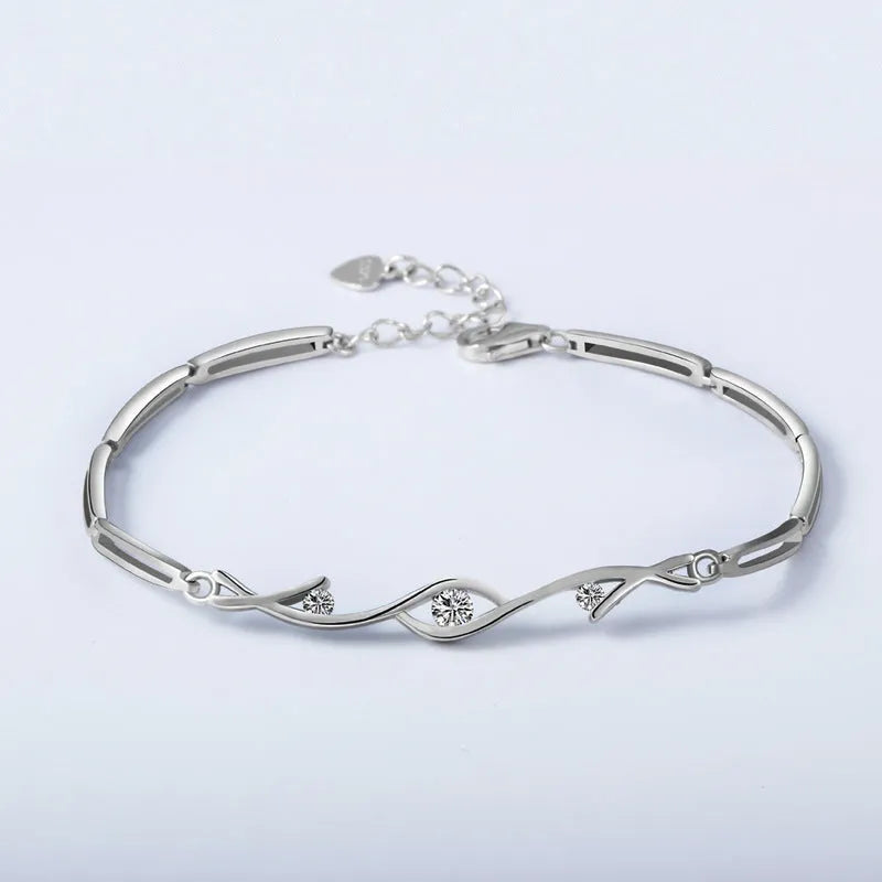 Crystal zircon pendant necklace on 925 sterling silver chain with white gold electroplate finish and clear faceted stone