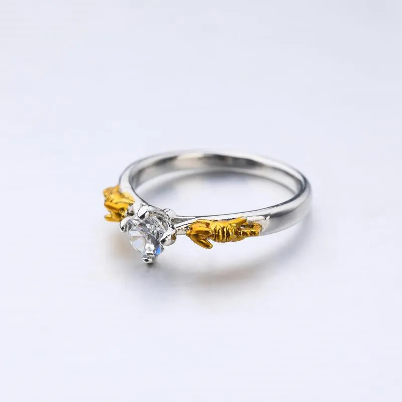 Copper crown cosplay ring with black gold finish and crystal details.