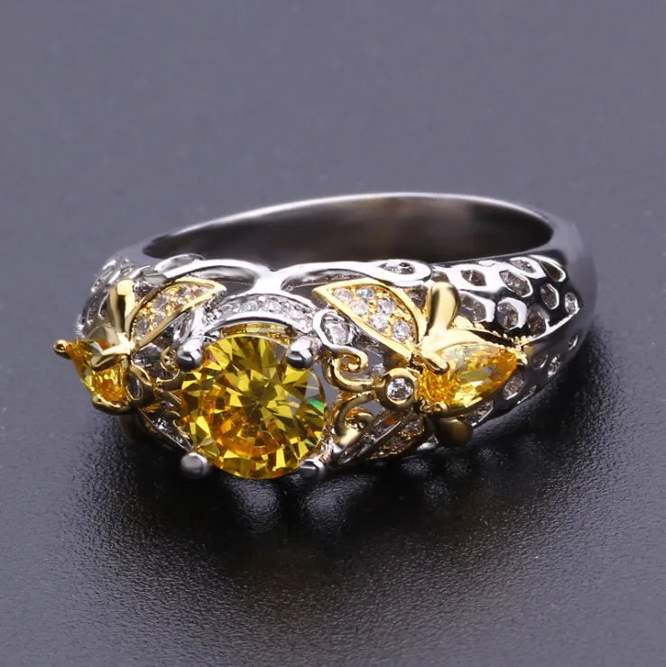 Geometric alloy ring with simulated zircon centre, available in sizes 6-10