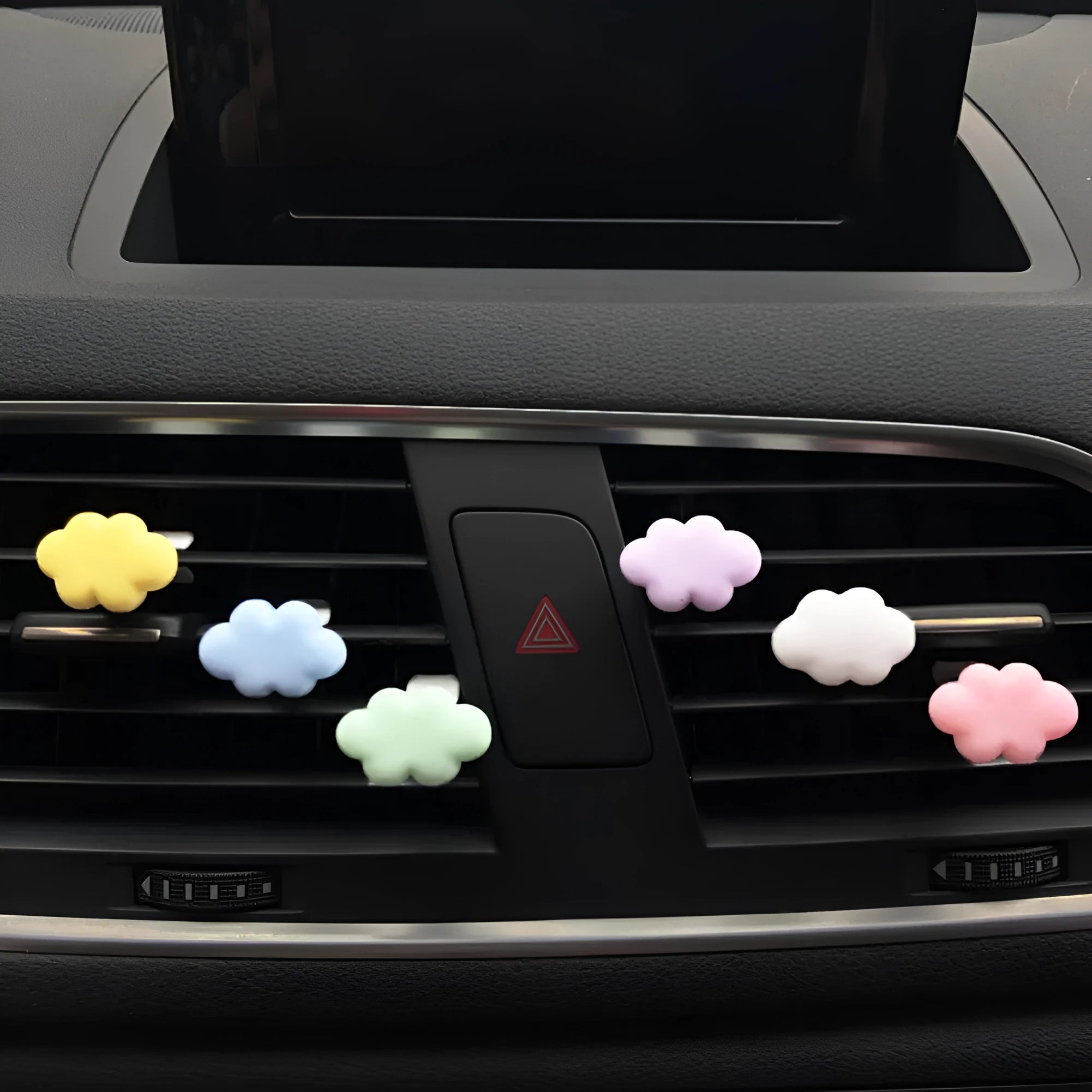 Resin cartoon Baiyun cloud car air freshener clip in light green, shown attached to a car air vent.