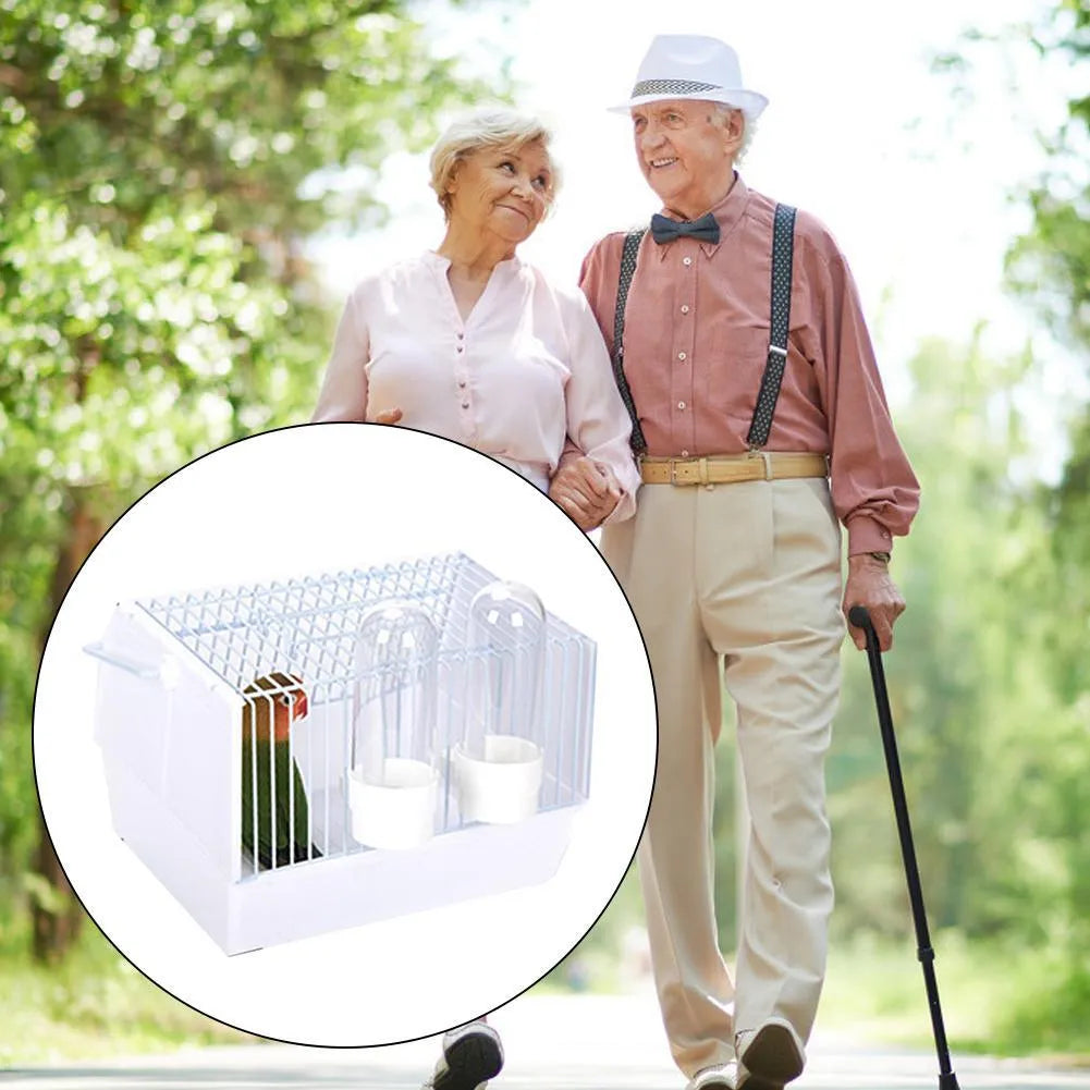 Small portable bird travel cage in black with top skylight and two feeders, 21 x 13 x 13 cm