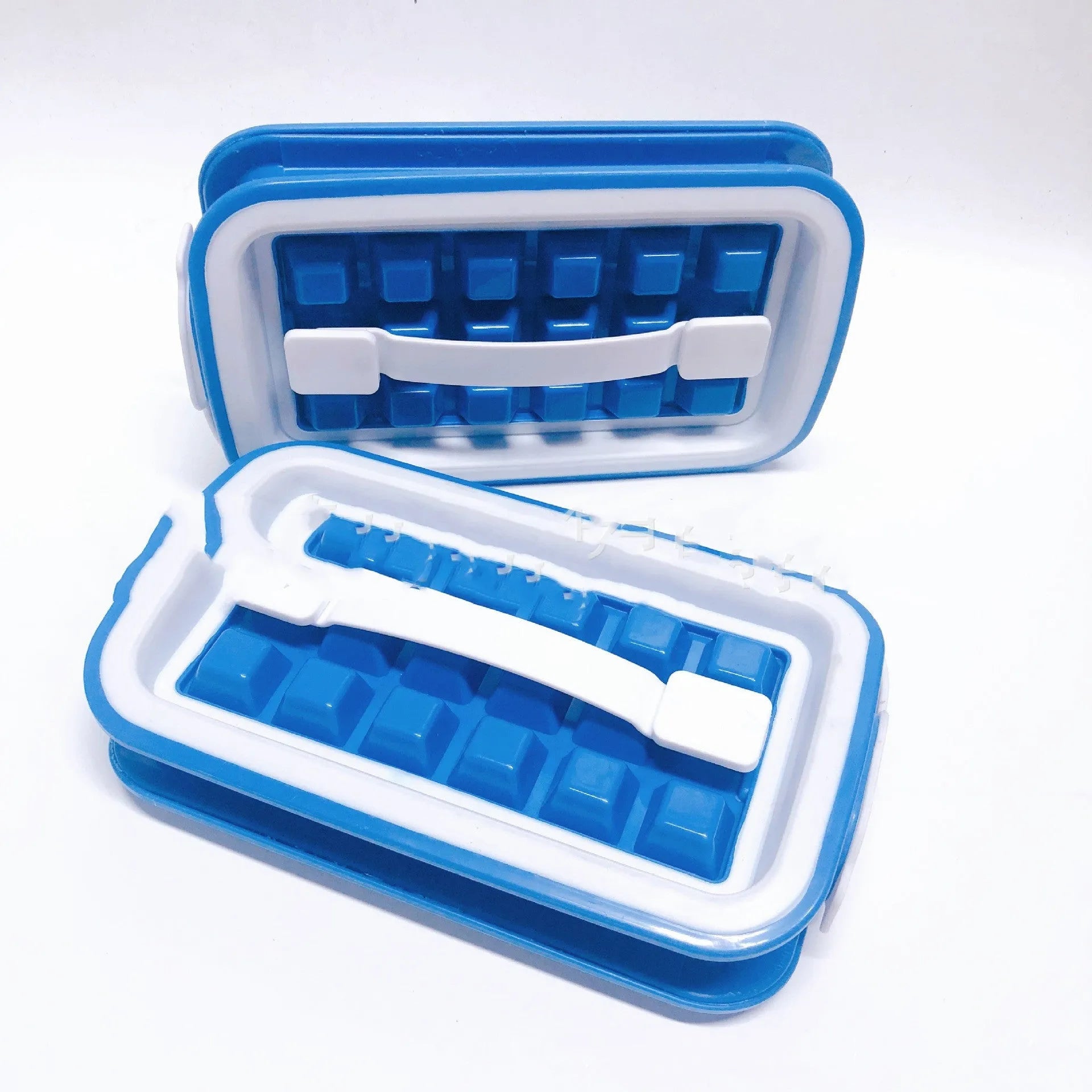 Blue silicone ice cube tray with 36 grid mould and lid on a white surface