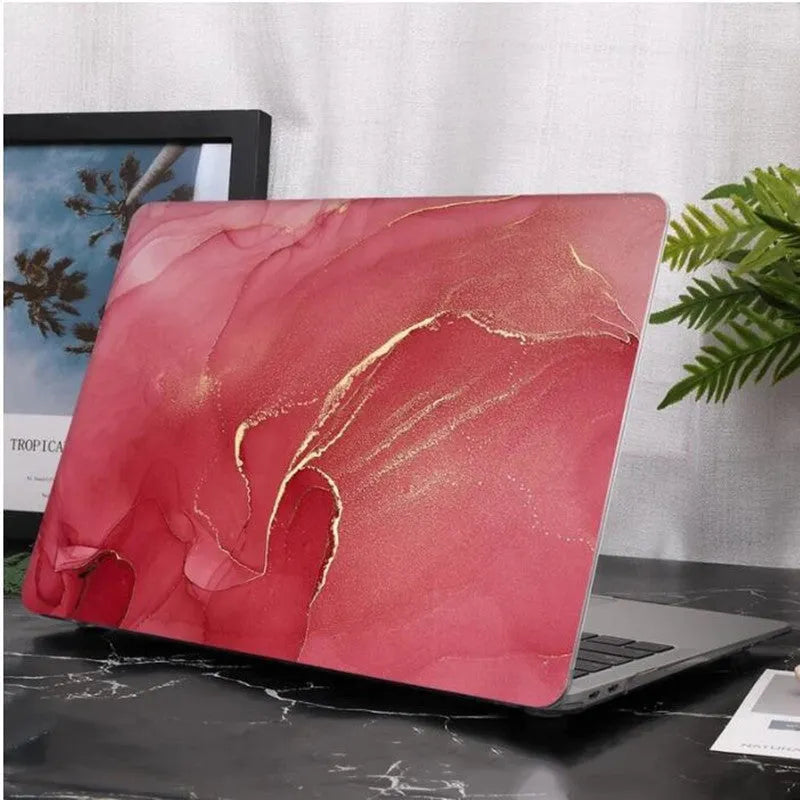 PC smudge protective case for MacBook Air and MacBook Pro in colour A, snapped onto a closed silver laptop
