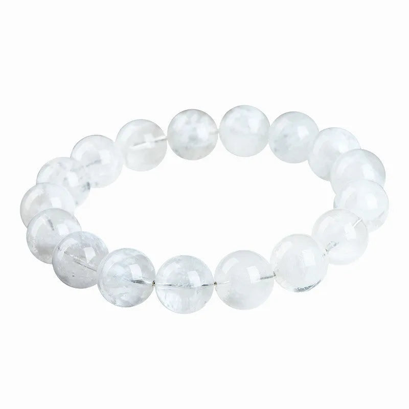 Close-up of a women's bracelet with round geometric crystal beads in a natural blizzard snowflake finish, showing Ruyi and Xiangyun design details.