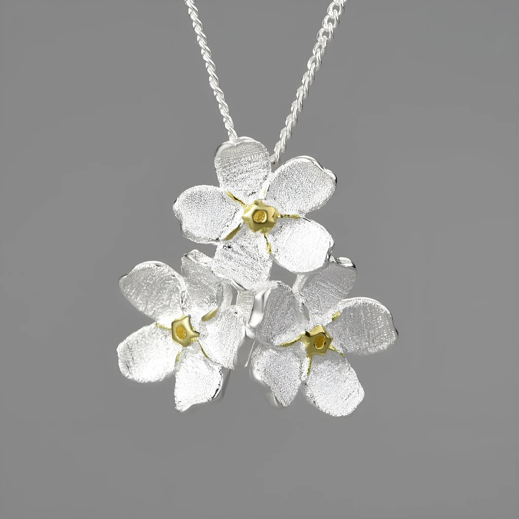 Myosotis Sylvatica sterling silver floral pendant with electroplated finish in pastoral style