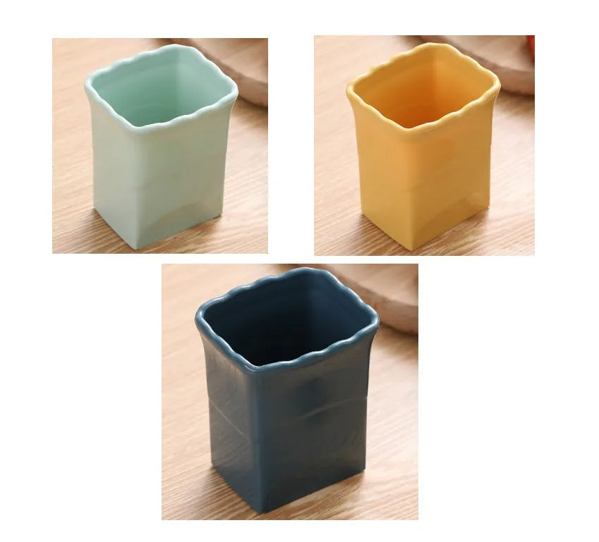 Green stainless steel cup slicer for fruit and vegetable cutting with compact design and visible blade area